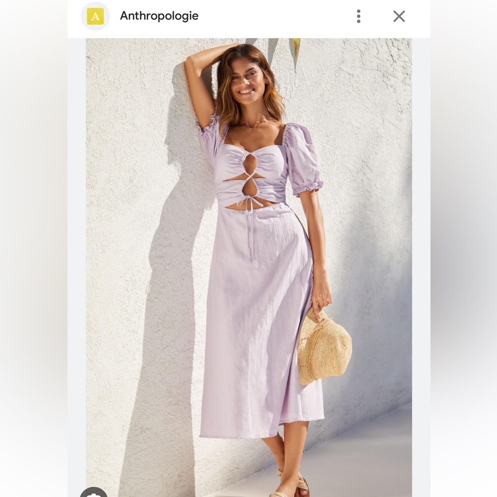 Charlie Holiday puff sleeve cut out dress from Anthropologie